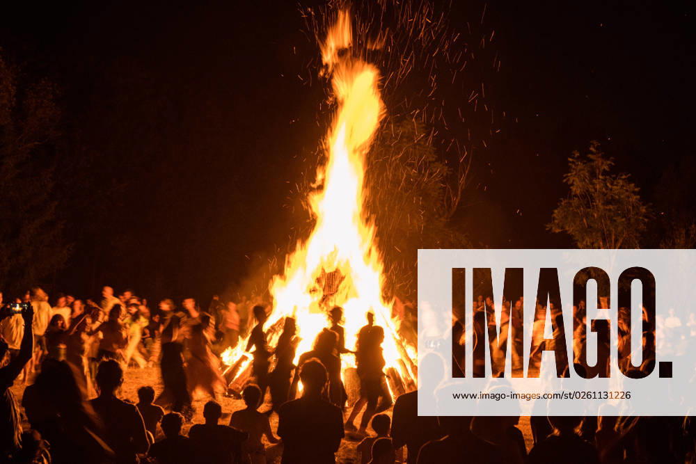 Solstice fire with large crowd, Tübingen, Baden Württemberg, Germany