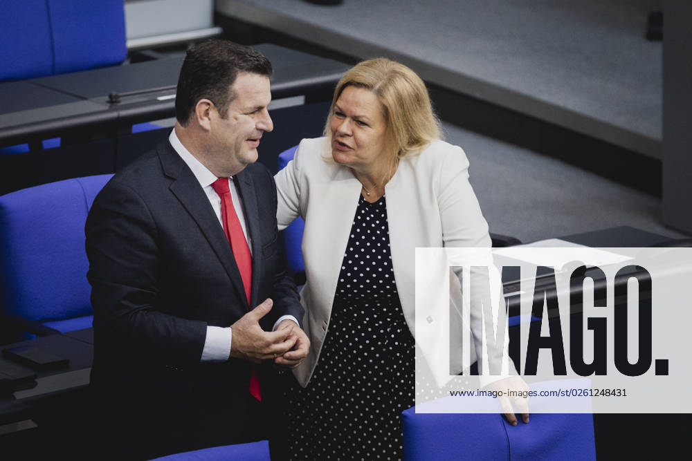 L R Hubertus Heil SPD , Federal Minister of Labor and Social Affairs, and Nancy Faeser SPD , Federal Minister of the Interior and Homeland, recorded during the debate in the German Bundestag on skilled worker immigration Berlin, 23 06 2023 Berlin Germany