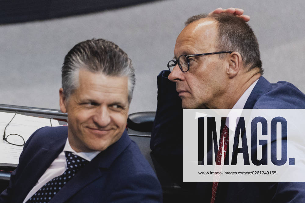 R L Friedrich Merz, CDU party leader, and Thorsten Frei, member of the German Bundestag CDU CSU , recorded during the debate in the German Bundestag on skilled labor immigration Berlin, 23 06 2023 Berlin Germany