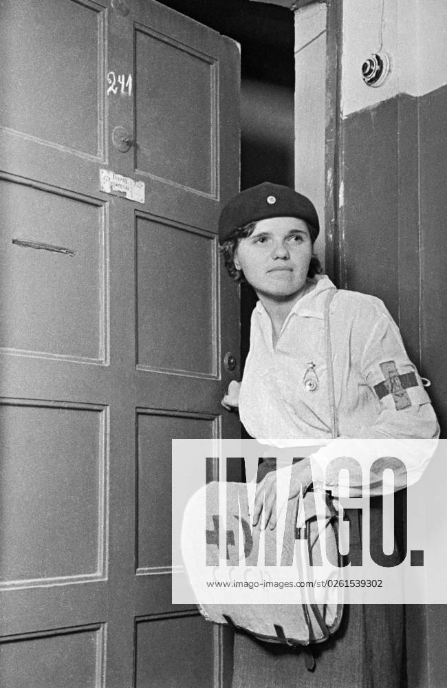 A nurse of the medical-sanitary service 661182 26.06.1941 Moscow. June 1941. A nurse of the medical-sanitary service. Anatoliy Garanin Sputnik Moscow Russia
