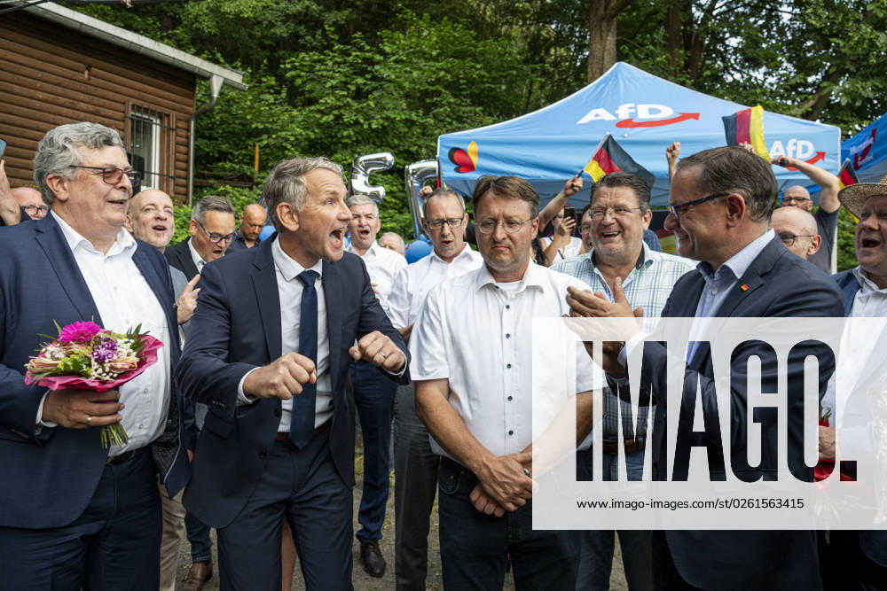 STICHWAHL ZUM LANDRAT IN SONNEBERG 25 06 2023 Sonneberg The runoff election for the new district administrator of the Sonneberg district on 25 June 2023 in Sonneberg Thuringia V l n r Carsten Hütter, Björn Höcke AfD , AfD district administrator candidate, Robert Sesselmann, and MdB Tino Chrupalla AfD cheer after the election victory in the Frankenbaude
