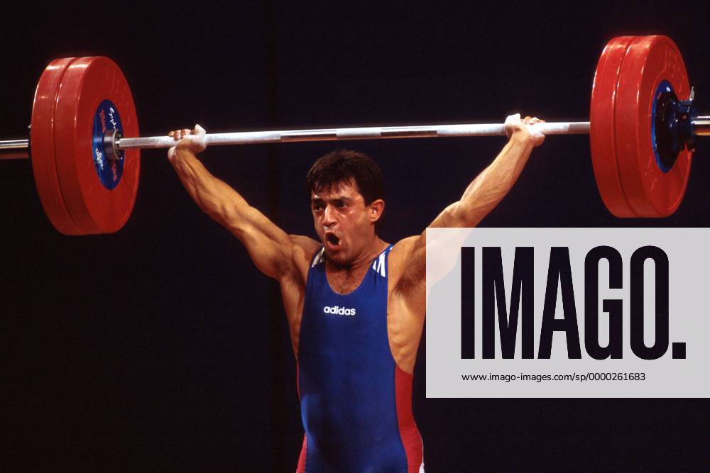 Ivan Ivanov (Bulgarien) - Reißen Gewichtheben OS Sommer Herren Olympische Sommerspiele 2000, Olympia, Olympiade, Spiele, Klasse bis 56kg, 56 kg, Kilogramm Einzelbild Convention and Exhibition Centre Sydney Anstrengung,