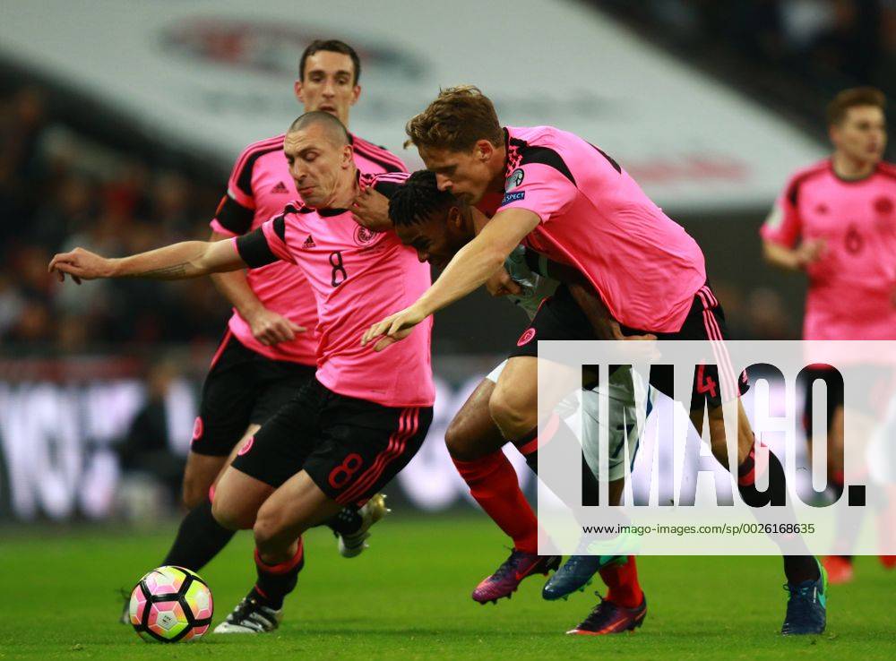 England v Scotland - FIFA World Cup WM Weltmeisterschaft Fussball 2018 Qualifier . . London, UK . . 11.11.2016 Scott Brown (S) Raheem Sterling (E) Christophe Berra (S)
