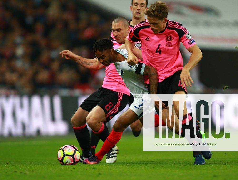 England v Scotland - FIFA World Cup WM Weltmeisterschaft Fussball 2018 Qualifier . . London, UK . . 11.11.2016 Scott Brown (S) Raheem Sterling (E) Christophe Berra (S)