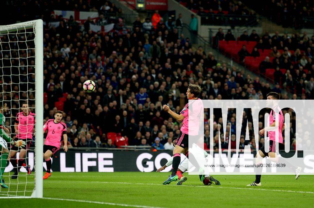 Daniel Sturridge of England heads the opening goal past Craig Gordon of Scotland during the FIFA World Cup WM Weltmeisterschaft Fussball Qualifying Group F match at Wembley Stadium, London. Picture date: November 11th, 2016. Pic David Klein Sportimage .