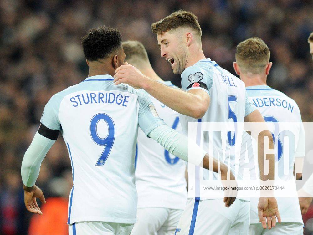 Football - 2016 2017 World Cup Qualifier - Group F: England vs. Scotland Gary Cahill celebrates his goal with fellow Goalscorer Daniel Sturridge at Wembley. COLORSPORT ANDREW COWIE