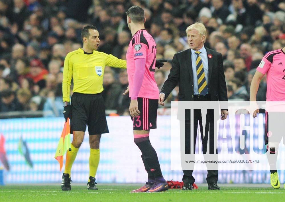 Football - 2016 2017 World Cup Qualifier - Group F: England vs. Scotland Scotland Manager Gordon Strachan is told to move back by the linesman at Wembley. COLORSPORT ANDREW COWIE