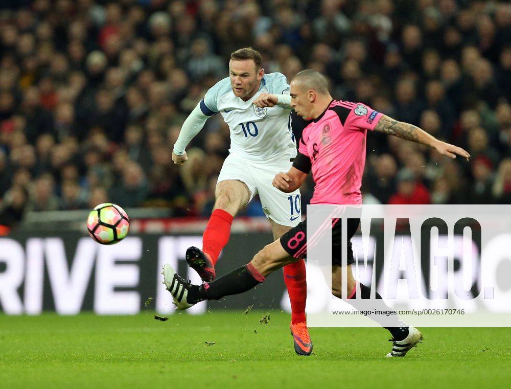 England s Wayne Rooney tussles with Scotland s Scott Brown during the World Cup Qualifying match at Wembley Stadium, London. Picture date November 11th, 2016 Pic David Klein Sportimage .