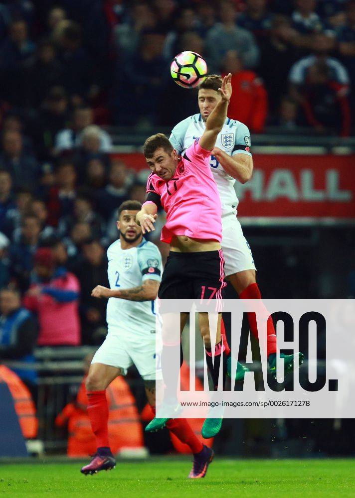 England v Scotland - FIFA World Cup WM Weltmeisterschaft Fussball 2018 Qualifier . . London, UK . . 11.11.2016 James McArthur (S) Gary Cahill (E)