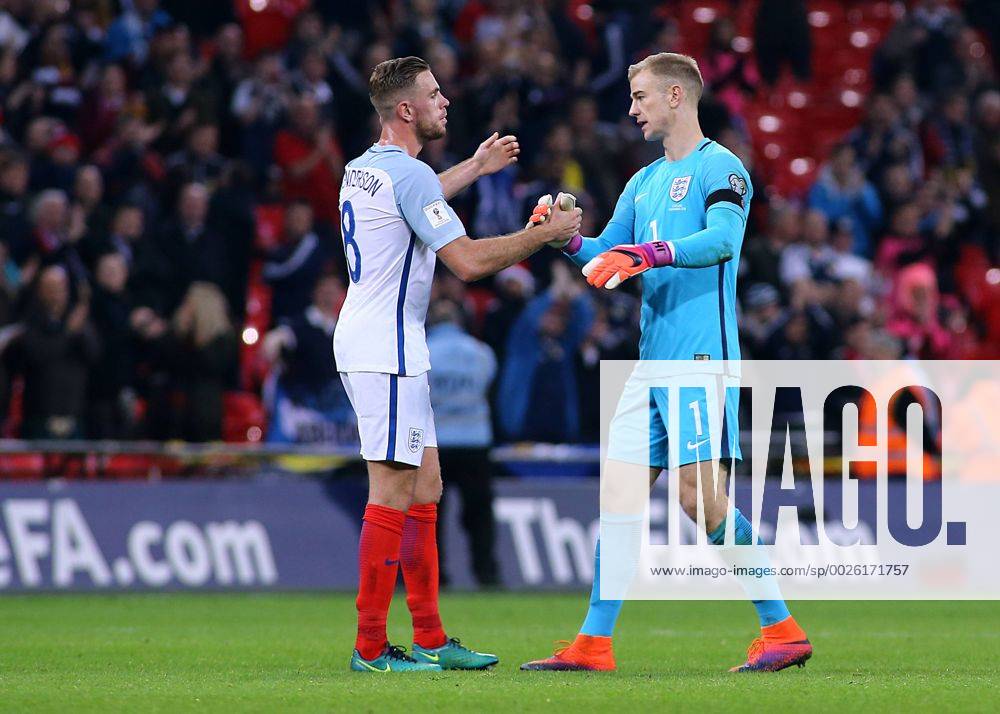Wembley Stadium, London, England. World Cup Qualifying Football. England versus Scotland. Jordan Henderson of England and Goalkeeper Joe Hart of England shake hands at full time Kertonx ActionPlus11808613