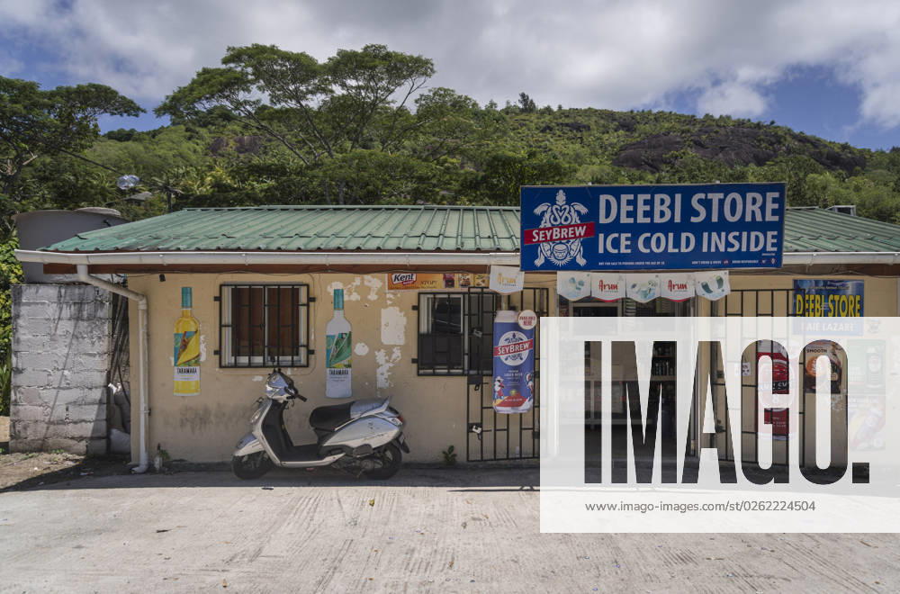 Seychelles Mahà Supermarket on the roadside A small supermarket on the roadside in the south of the Seychelles main island Mahà waiting for customers Even outside the capital Victoria such corner stores offer goods of daily needs Victoria Mahà Seychelles