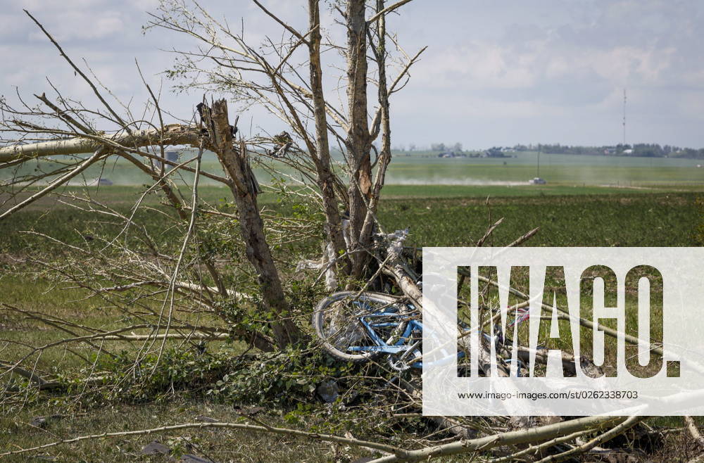 A bicycle is twisted into a tree after a tornado damaged homes near Carstairs, Alta., Saturday, July 1, 2023. No injuries were reported. Carstairs CANADA - ZUMAc35_ 20230701_zaf_c35_132