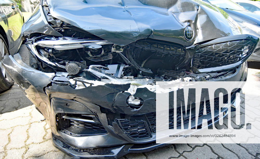 Passenger car accident vehicle parked with fontal damage airbags in vehicle addressed in impact