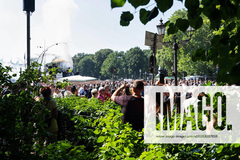 Tens of thousands of people take part in techno parade Rave the Planet Loveparade founder Dr Motte is the organizer Street of 17 June in the Great Tiergarten