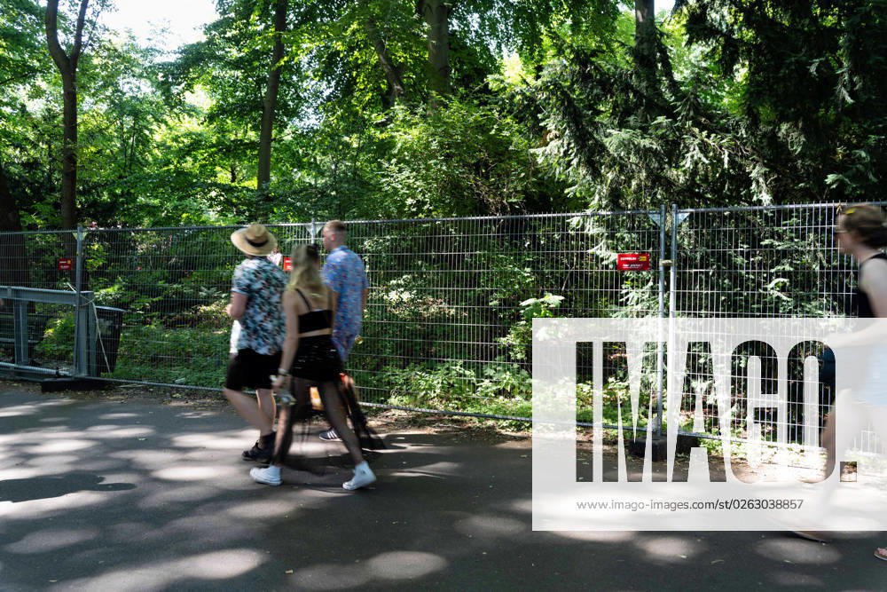 Tens of thousands of people take part in techno parade Rave the Planet Loveparade founder Dr Motte is the organizer Straße des 17 Juni in Großer Tiergarten A fence is erected