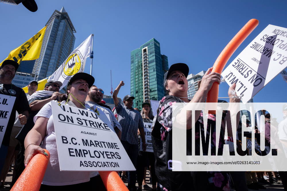 Striking port workers from the International Longshore and Warehouse Union Canada cheer as speakers encourage the crowd while attending a rally in Vancouver, on Sunday, July 9, 2023. VANCOUVER CANADA - ZUMAc35_ 20230709_zaf_c35_039