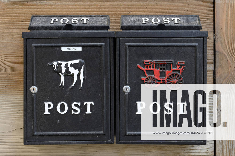 Mailbox with milk cow and carriage icon image, Switzerland