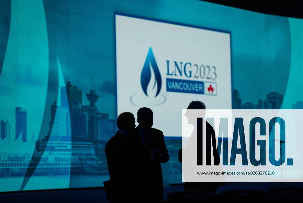 Delegates are silhouetted before the start of the LNG2023 conference, in Vancouver, B.C., Monday, July 10, 2023. VANCOUVER CANADA - ZUMAc35_ 20230710_zaf_c35_134
