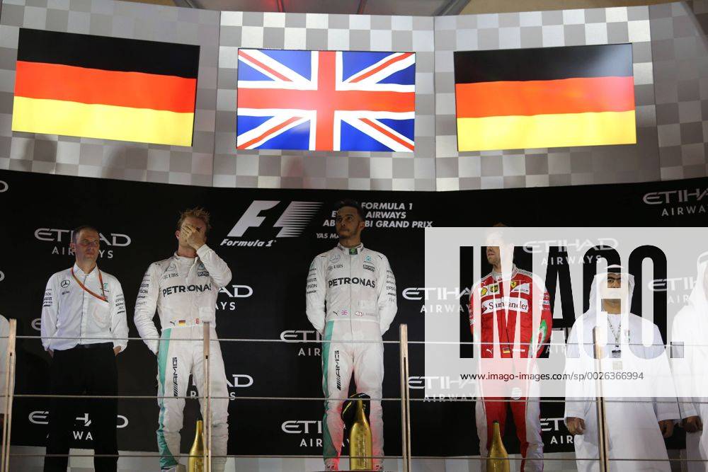 Abu Dhabi Grand Prix, UAE 24 - 27 November 2016 27.11.2016 - Race, 2nd place Nico Rosberg (GER) Mercedes AMG F1 W07 Hybrid and Champion 2016, Lewis Hamilton (GBR) Mercedes AMG F1 W07 Hybrid race winner and 3rd place Sebastian Vettel (GER) Scuderia Ferrari SF16-H