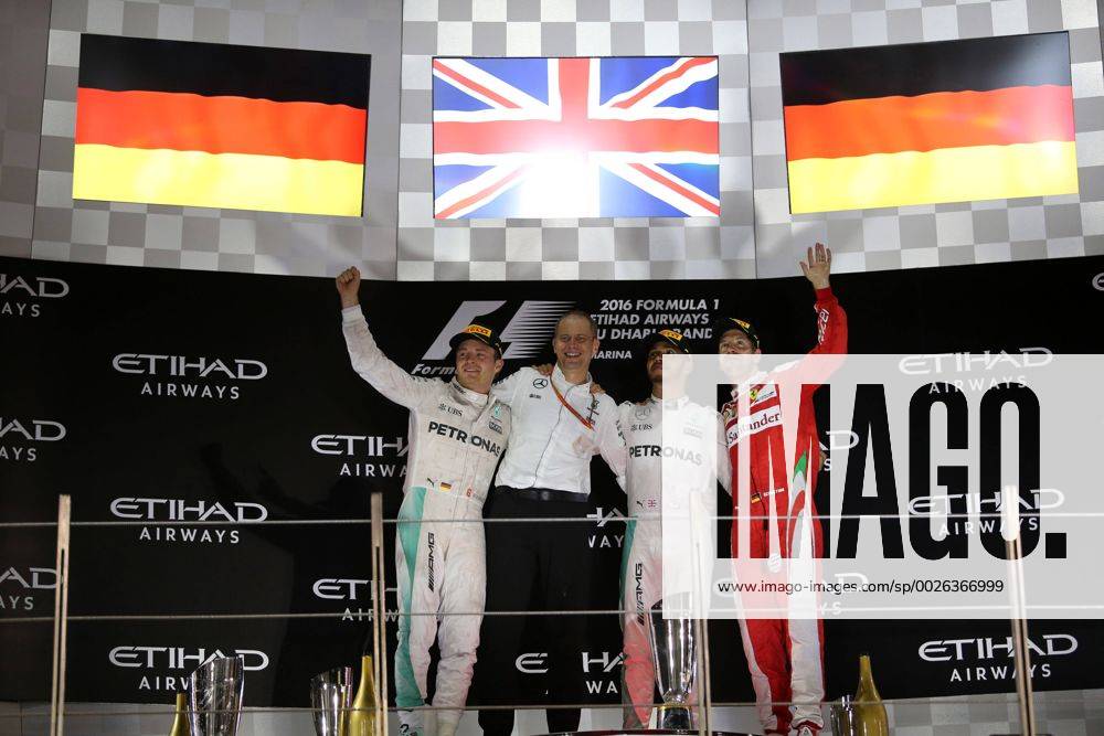 Abu Dhabi Grand Prix, UAE 24 - 27 November 2016 27.11.2016 - Race, 2nd place Nico Rosberg (GER) Mercedes AMG F1 W07 Hybrid and Champion 2016, Lewis Hamilton (GBR) Mercedes AMG F1 W07 Hybrid race winner and 3rd place Sebastian Vettel (GER) Scuderia Ferrari SF16-H