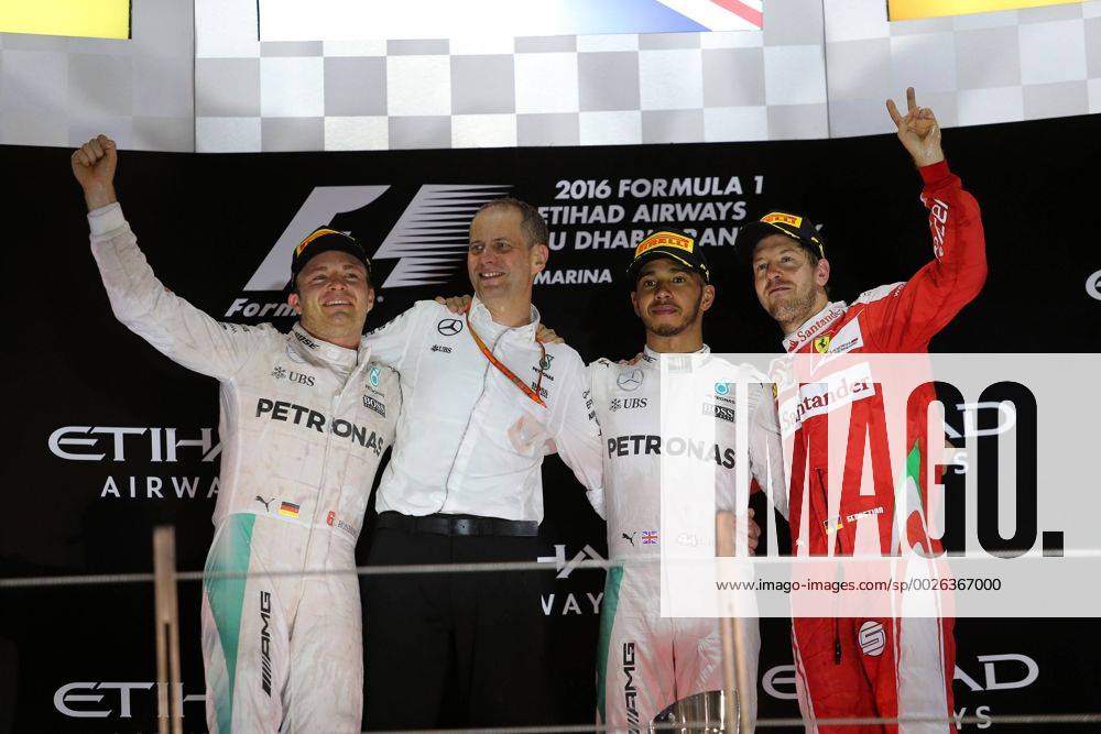 Abu Dhabi Grand Prix, UAE 24 - 27 November 2016 27.11.2016 - Race, 2nd place Nico Rosberg (GER) Mercedes AMG F1 W07 Hybrid and Champion 2016, Lewis Hamilton (GBR) Mercedes AMG F1 W07 Hybrid race winner and 3rd place Sebastian Vettel (GER) Scuderia Ferrari SF16-H
