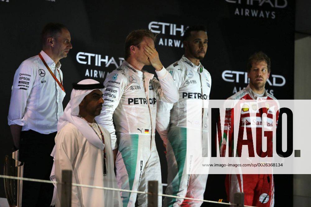 Abu Dhabi Grand Prix, UAE 24 - 27 November 2016 27.11.2016 - Race, 2nd place Nico Rosberg (GER) Mercedes AMG F1 W07 Hybrid and Champion 2016, Lewis Hamilton (GBR) Mercedes AMG F1 W07 Hybrid race winner and 3rd place Sebastian Vettel (GER) Scuderia Ferrari SF16-H