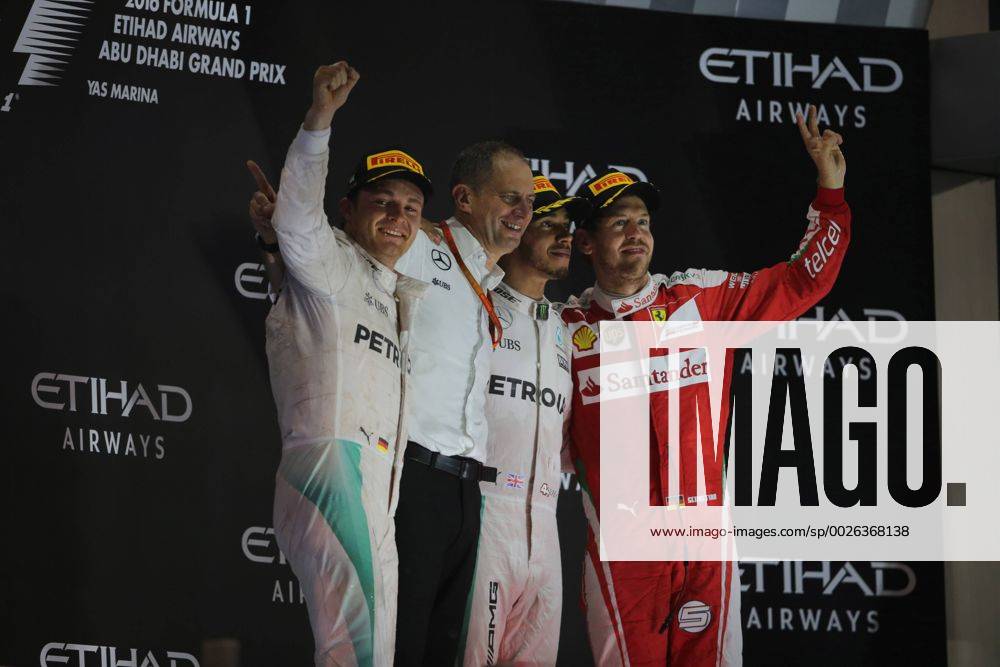 Abu Dhabi Grand Prix, UAE 24 - 27 November 2016 27.11.2016 - Race, 2nd place Nico Rosberg (GER) Mercedes AMG F1 W07 Hybrid and Champion 2016, Lewis Hamilton (GBR) Mercedes AMG F1 W07 Hybrid race winner and 3rd place Sebastian Vettel (GER) Scuderia Ferrari SF16-H
