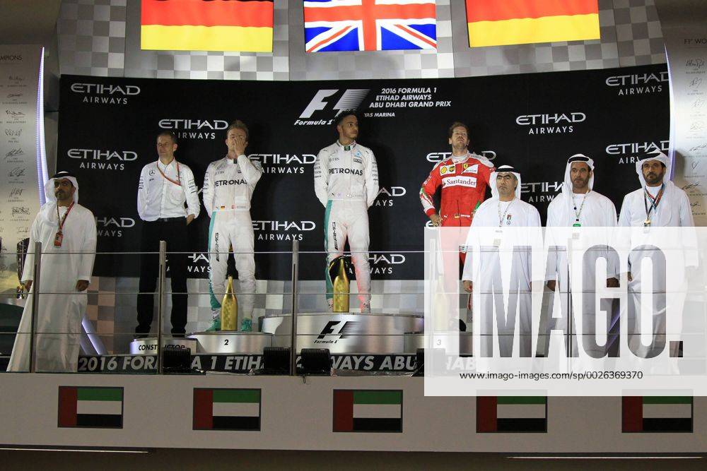Abu Dhabi, UAE. Formula 1 Grand Prix Abu Dhabi, race day. Mercedes AMG Petronas W07 Hybrid & x2013; Lewis Hamilton wins the Abu Dhabi GP on the podium with Rosberg and Vettel xLeannexBoonx ActionPlus11814939
