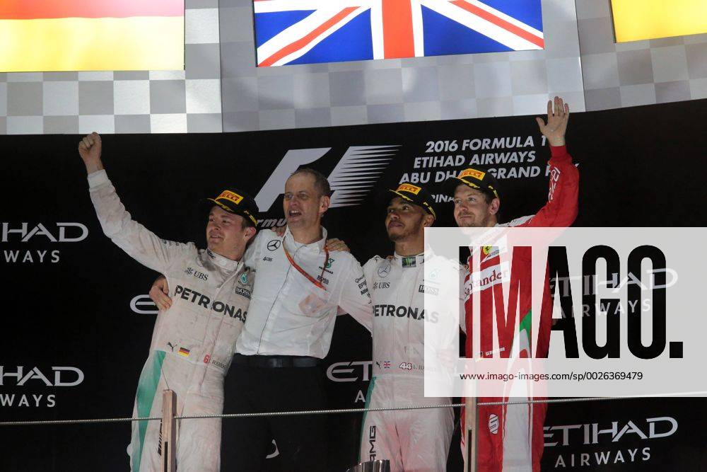 Abu Dhabi Grand Prix, UAE 24 - 27 November 2016 27.11.2016 - Race, 2nd place Nico Rosberg (GER) Mercedes AMG F1 W07 Hybrid and Champion 2016, Lewis Hamilton (GBR) Mercedes AMG F1 W07 Hybrid race winner and 3rd place Sebastian Vettel (GER) Scuderia Ferrari SF16-H