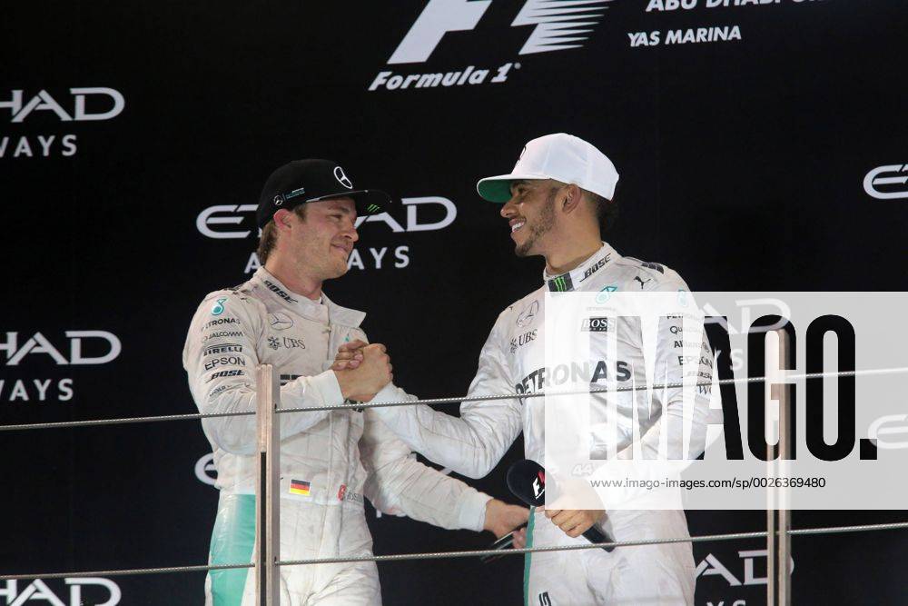 Abu Dhabi Grand Prix, UAE 24 - 27 November 2016 27.11.2016 - Race, 2nd place Nico Rosberg (GER) Mercedes AMG F1 W07 Hybrid and Champion 2016 and Lewis Hamilton (GBR) Mercedes AMG F1 W07 Hybrid race winner