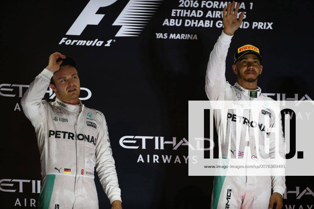 Abu Dhabi Grand Prix, UAE 24 - 27 November 2016 27.11.2016 - Race, 2nd place Nico Rosberg (GER) Mercedes AMG F1 W07 Hybrid and Champion 2016 and Lewis Hamilton (GBR) Mercedes AMG F1 W07 Hybrid race winner