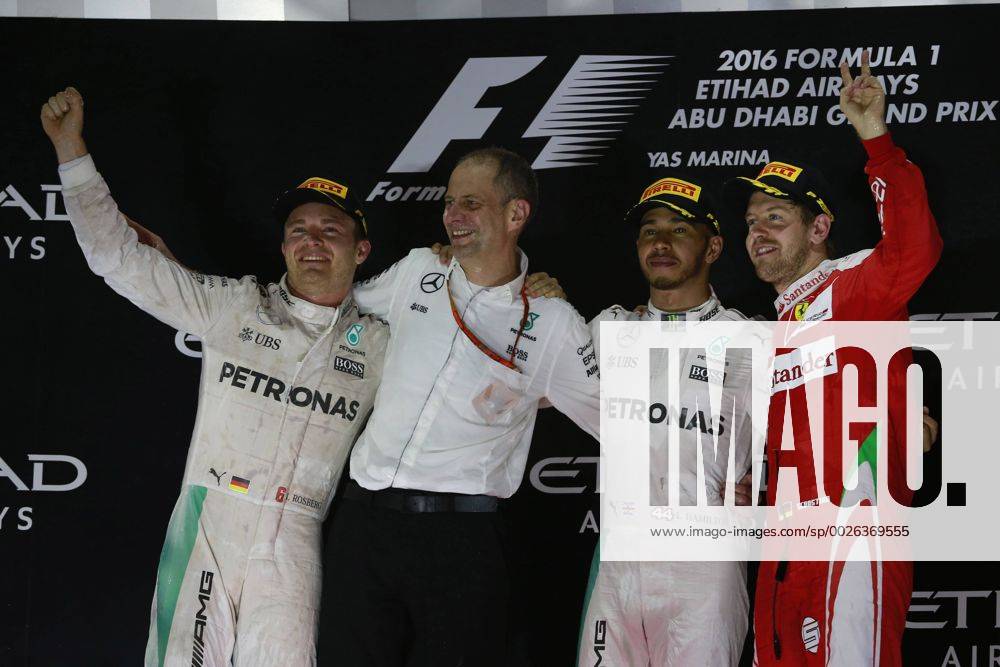 Abu Dhabi Grand Prix, UAE 24 - 27 November 2016 27.11.2016 - Race, 2nd place Nico Rosberg (GER) Mercedes AMG F1 W07 Hybrid and Champion 2016, Lewis Hamilton (GBR) Mercedes AMG F1 W07 Hybrid race winner and 3rd place Sebastian Vettel (GER) Scuderia Ferrari SF16-H