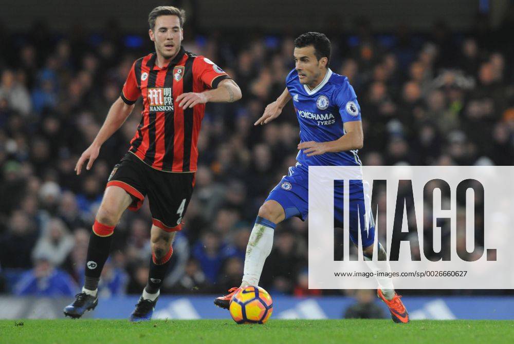 Football - 2016 2017 Premier League - Chelsea vs. AFC Bournemouth Pedro of Chelsea and Dan Gosling of Bournemouth at Stamford Bridge. COLORSPORT ANDREW COWIE