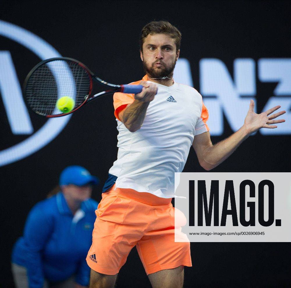 (170121) -- MELBOURNE, Jan. 21, 2017 -- Gilles Simon of France returns the ball during the men s singles third round match against Milos Raonic of Canada at the Australian Open Tennis Championships in Melbourne, Australia, Jan. 21, 2017. Simon lost 1-3. ) (SP)AUSTRALIA-MELBOURNE-TENNIS-AUSTRALIAN OPEN-DAY 6 ZhuxHongye