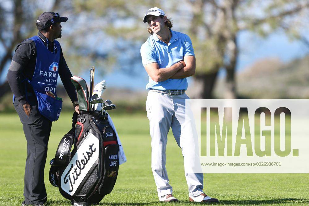 San Diego, California, United States - Andrew Loupe (R) speaks to his caddie Wayne Birch on the 13th fairway during the first round of the Farmers Insurance Open at Torrey Pines GC. Golf 2017 - Farmers Insurance Open - First Round - ZUMAw109 20170126_zap_w109_073