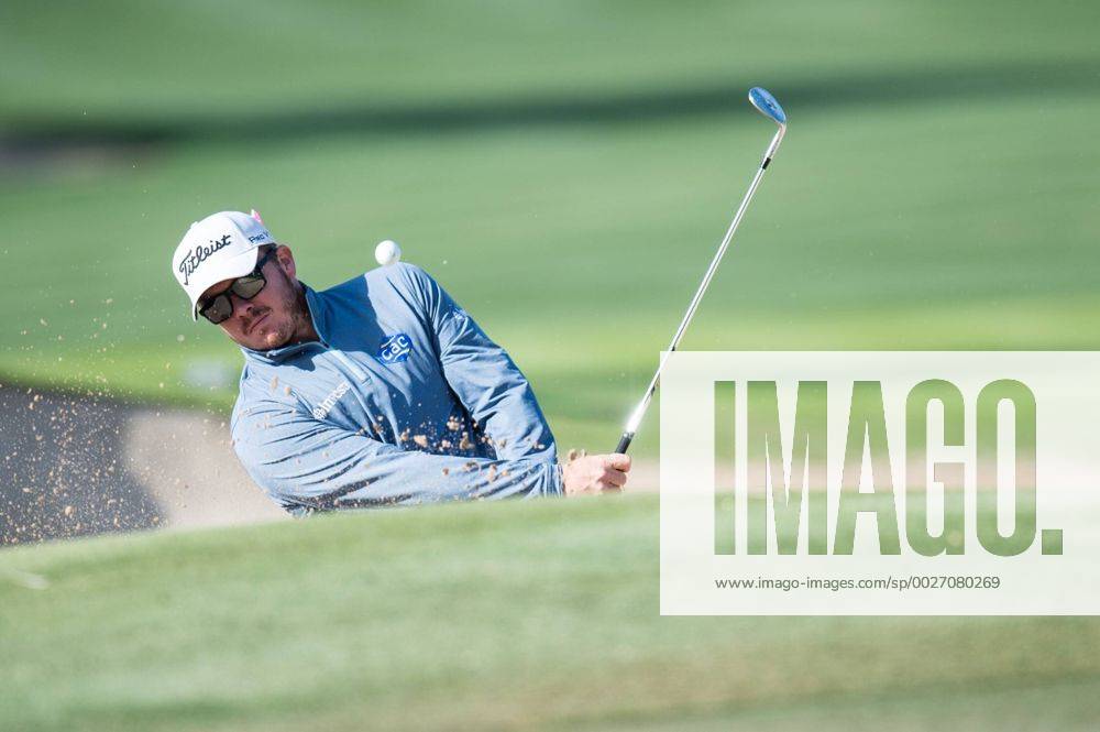 George Coetzee of South Africa plays from the bunker while completing his second round during the PGA Golf Herren European Tour Dubai Desert Classic Tournament Day 3 at the Emirates Golf Club, Dubai, UAE on 4 February 2017.