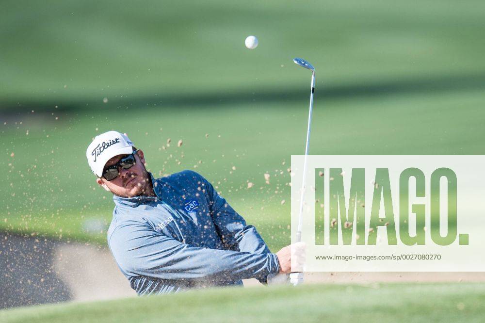 George Coetzee of South Africa plays from the bunker while completing his second round during the PGA Golf Herren European Tour Dubai Desert Classic Tournament Day 3 at the Emirates Golf Club, Dubai, UAE on 4 February 2017.