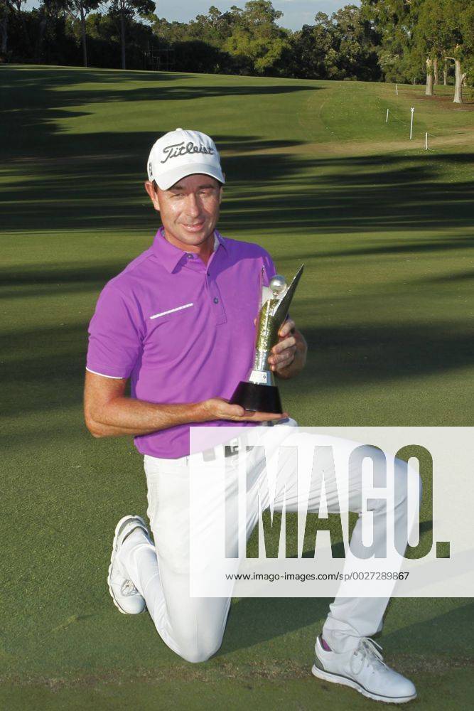 February 19th 2017, Lake Karrinyup Country Club, Perth, Western Australia, Australia; ISPS Handa World Super 6 Perth Golf Tournament Day 4; Brett Rumford (AUS) holds the winners trophy after beating Phachara Khongwatmai (THA) Woodleyx ActionPlus11848429