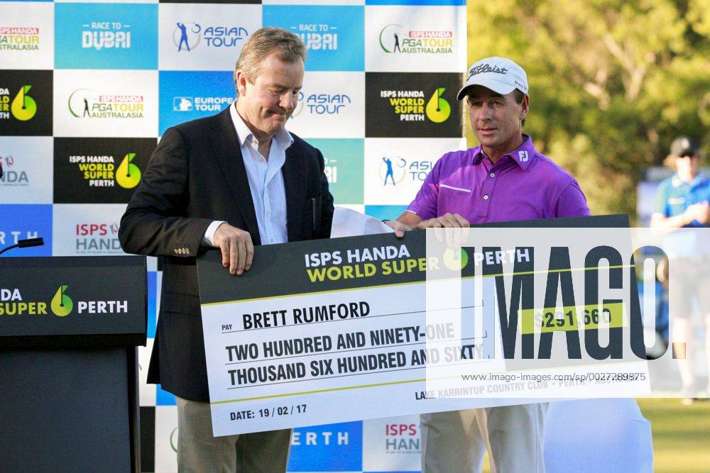 February 19th 2017, Lake Karrinyup Country Club, Perth, Western Australia, Australia; ISPS Handa World Super 6 Perth Golf Tournament Day 4; Brett Rumford holds his winners cheque after winning the tornament Woodleyx ActionPlus11848437