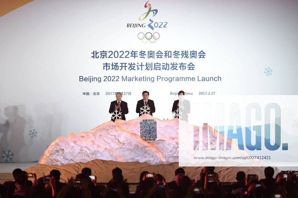 - SPORT (170227) -- BEIJING , Feb. 27, 2017 -- Beijing 2022 President Guo Jinlong (C), International Olympic Committee (IOC) Vice President Yu Zaiqing(L) and IOC Coordination Commission Chairman Alexander Zhukov clap after they put the white snowflake into a model of snow mountain to unlock the marketing program of Beijing 2022 Olympic and Paralympic Winter games Winterspiele Spiele Summer games (Beijing 2022) in Beijing, capital of China, Feb. 27, 2017. The marketing program for Beijing 2022 was officially launched by the organizers here on Monday. )(wll) (SP)CHINA-BEIJING-2022-MARKETING PROGRAM(CN) JuxHuanzong