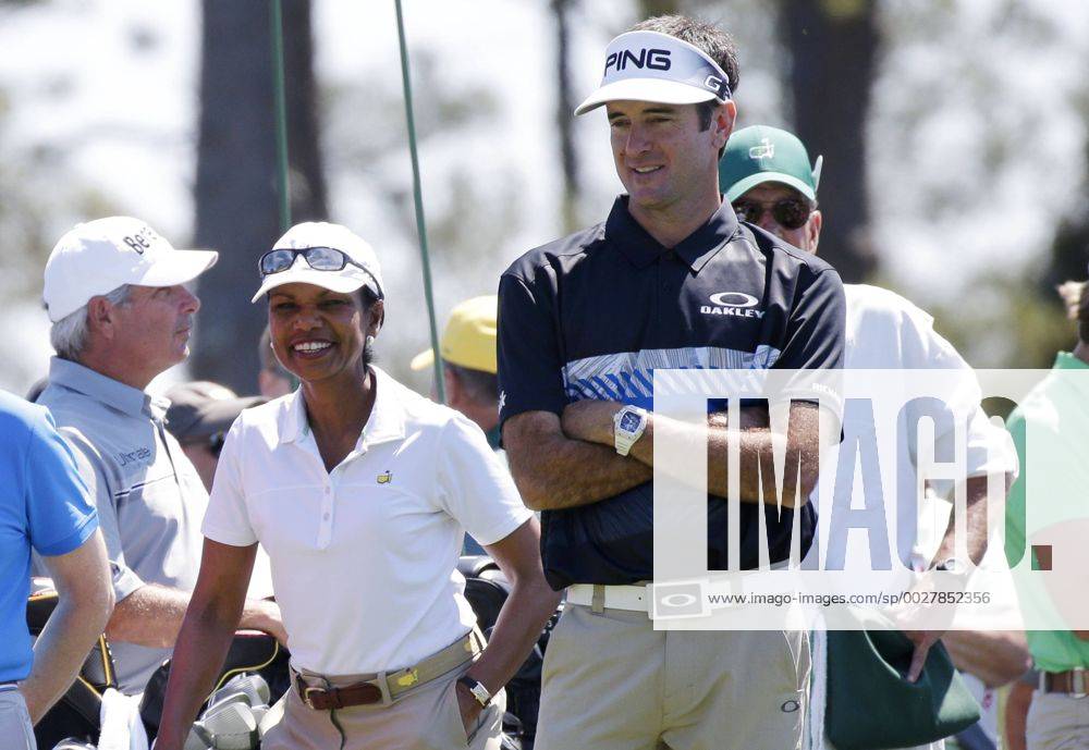 Former United States Secretary of State Condoleezza Rice and Bubba Watson watch Jordan Spieth hit a tee shot while playing a practice round at the 2017 Masters Tournament at Augusta National Golf Club in Augusta, Georgia on April 2, 2017. AUG20170402126 JOHNxANGELILLO