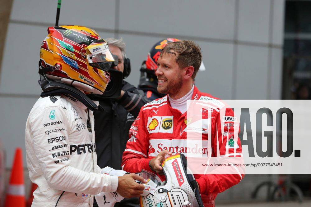Chinese Grand Prix, Shanghai 06 - 09 April 2017 09.04.2017 - Race, Lewis Hamilton (GBR) Mercedes AMG F1 W08 race winner and 2nd place Sebastian Vettel (GER) Scuderia Ferrari SF70H