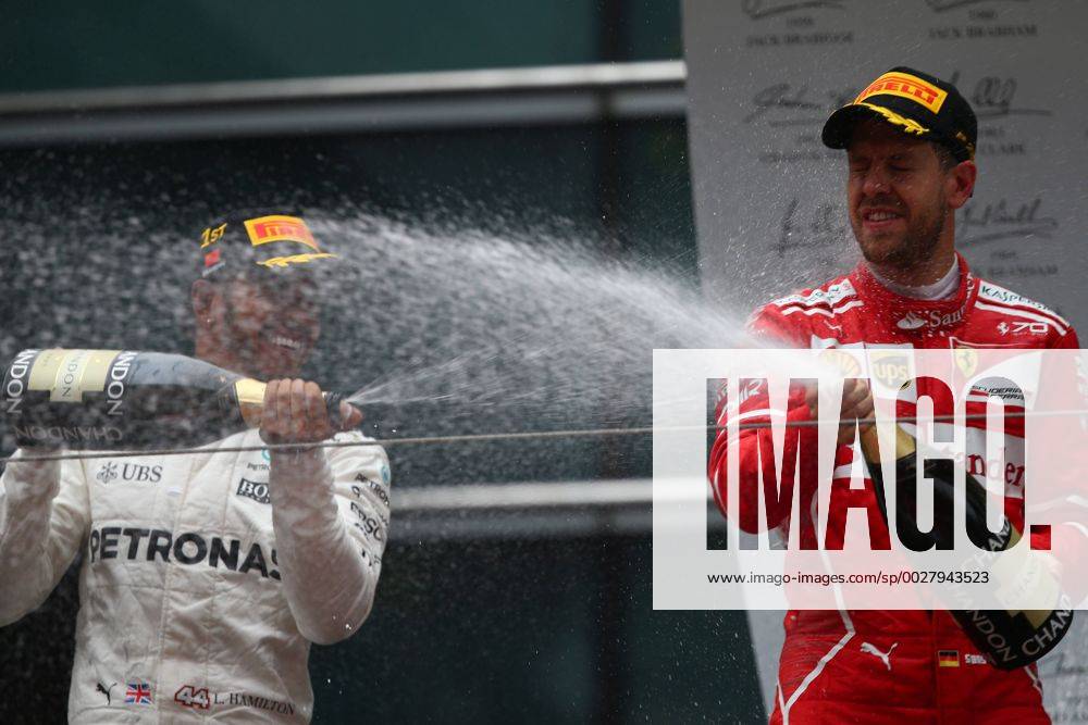 Chinese Grand Prix, Shanghai 06 - 09 April 2017 09.04.2017 - Race, Lewis Hamilton (GBR) Mercedes AMG F1 W08 race winner and 2nd place Sebastian Vettel (GER) Scuderia Ferrari SF70H