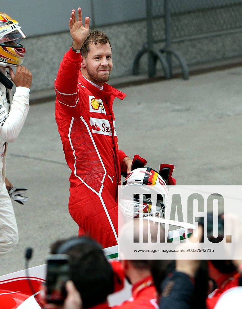 (170409) -- SHANGHAI, April 9, 2017 -- Ferrari s German driver Sebastian Vettel waves to supporters after the Formula One Chinese Grand Prix at the Shanghai International Circuit in Shanghai, east China, April 9, 2017. ) (SP)CHINA-SHANGHAI-F1-2017 CHINESE GRAND PRIX(CN) fanxjun