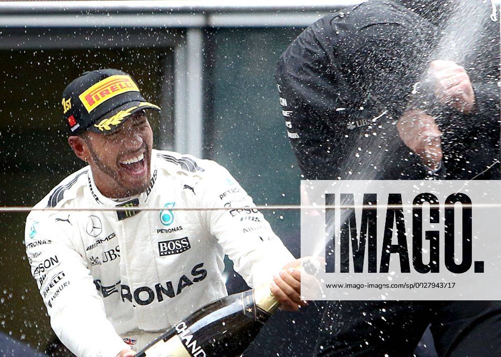 (170409) -- SHANGHAI, April 9, 2017 -- Mercedes driver Lewis Hamilton of Britain celebrates with champagne on the podium after winning the Formula One Chinese Grand Prix at the Shanghai International Circuit in Shanghai, east China, April 9, 2017. ) (SP)CHINA-SHANGHAI-F1-2017 CHINESE GRAND PRIX(CN) fanxjun