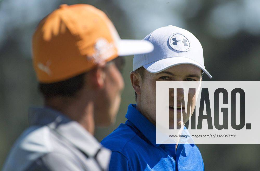 Jordan Spieth talks to Ricky Fowler during the fourth round of the 2017 Masters Tournament at Augusta National Golf Club in Augusta, Georgia on April 9, 2017. AUG20170409311 KEVINxDIETSCH