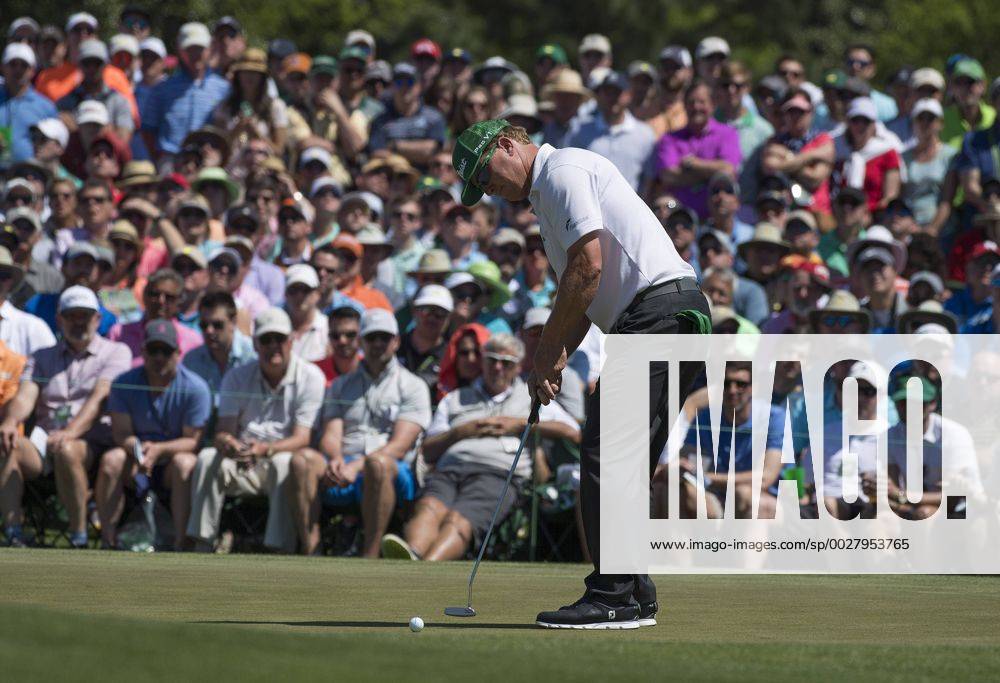 Charlie Hoffman putts for birdie on the second green during the fourth round of the 2017 Masters Tournament at Augusta National Golf Club in Augusta, Georgia on April 9, 2017. AUG20170409320 KEVINxDIETSCH