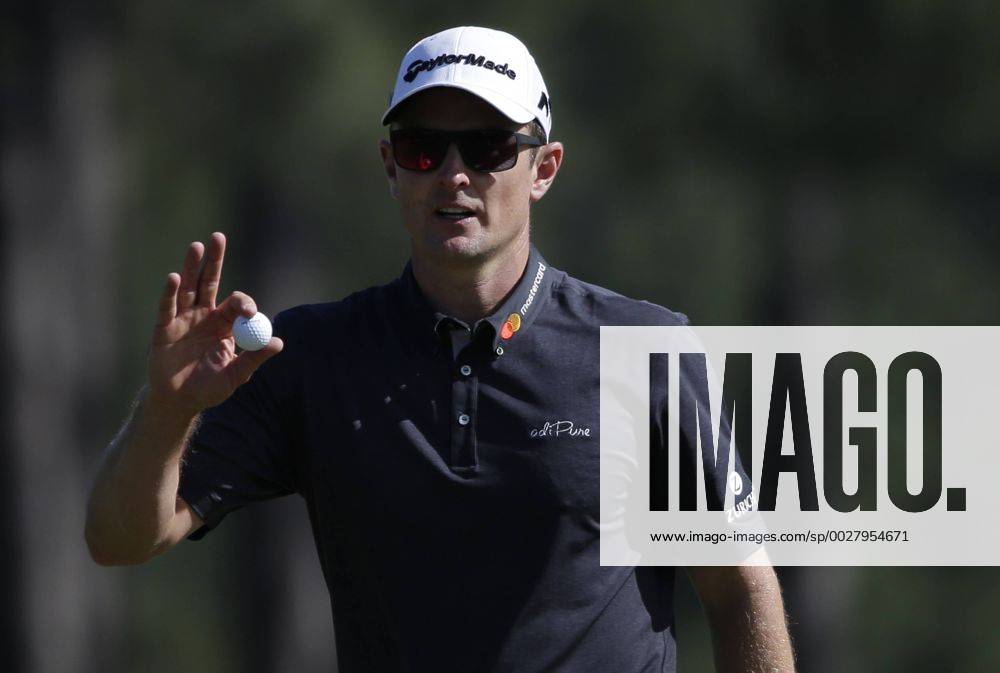 Justin Rose of England reacts as he walks off of the 8th green after making a putt for birdie in the final round at the 2017 Masters Tournament at Augusta National Golf Club in Augusta, Georgia on April 9, 2017. AUG20170409604 JOHNxANGELILLO