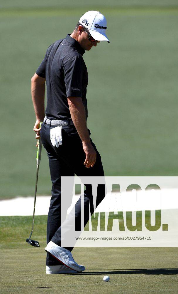 Augusta, GA, USA - Justin Rose glances down at his ball after missing his first putt attempt on the second green during the final round of the Masters Tournament on Sunday, April 9, 2017 at Augusta National Golf Club in Augusta, Ga. 2017 Masters Round 4 - ZUMAm67_ 20170409_zaf_m67_022