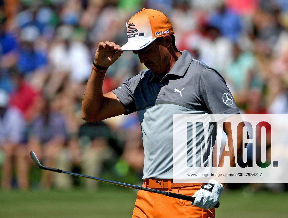 Augusta, GA, USA - Rickie Fowler studies his line to the pin prior to chipping onto the second green during the final round of the Masters Tournament on Sunday, April 9, 2017 at Augusta National Golf Club in Augusta, Ga. 2017 Masters Round 4 - ZUMAm67_ 20170409_zaf_m67_030